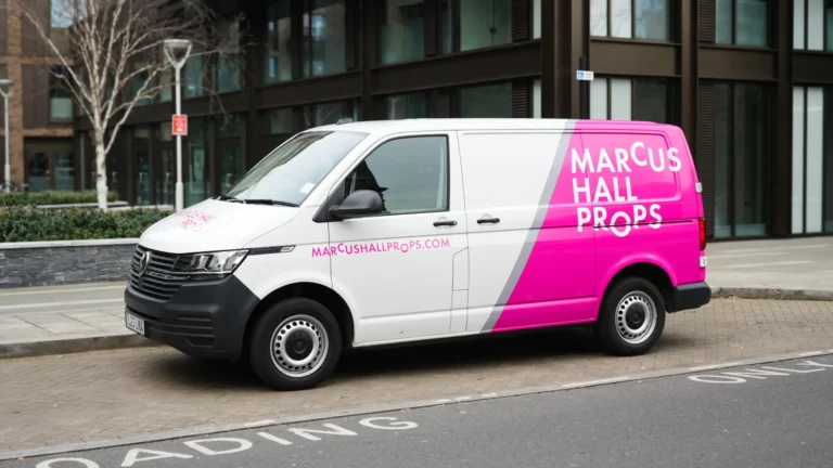 Marcus Hall Props van wrap by a wrap company near me in London with bold pink and white design