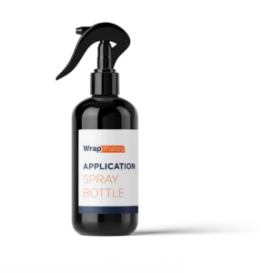 Wrapmates application spray bottle used for prepping surfaces and applying vinyl wraps and vehicle decals during van wrap installation.