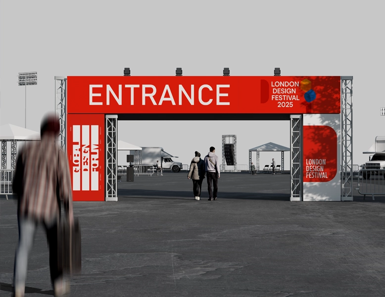 A large red and white entrance gantry for the London Design Festival 2025, featuring bold "ENTRANCE" text and event logos supported by silver trussing.