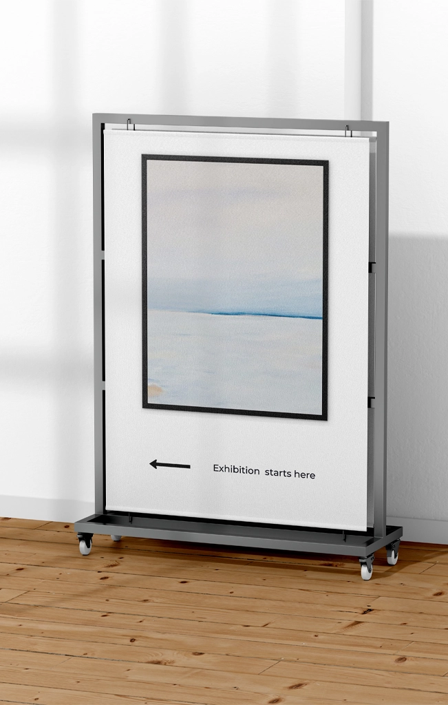 Large white rigid board featuring the blue Waymo logo and "A Google company" branding, displayed in a modern office or event space.