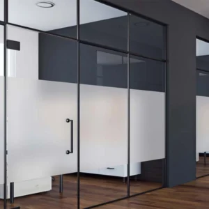Large frosted vinyl privacy panel on black-framed industrial style glass partitions.